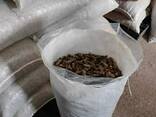 Fuel wood pellets in granules. Пеллеты топливные деревянные в гранулах - фото 1